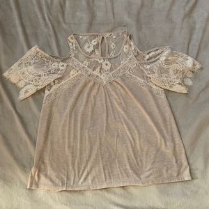 Cream blouse with the lace cut out sleeves